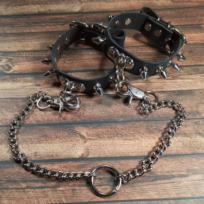 Bondage Lederfesselband - Killer Niete mit Ring der O und Panzerkette