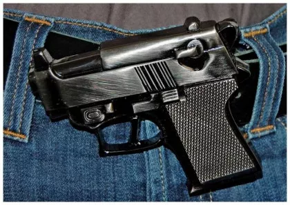 Gürtelschnalle Waffe