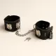 Faux Leather Handcuffs with Chain – Chrome BDSM Accessory
